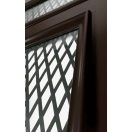 Porte d'entrée alu mi-vitrée avec grille alu